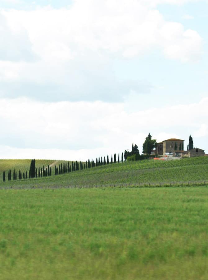 Rolling hills in the Tuscan countryside. Read why you should include Tuscany on your first trip to Europe with the perfect plan for visiting Europe for first time visitors! #travel #tuscany #italy #europe