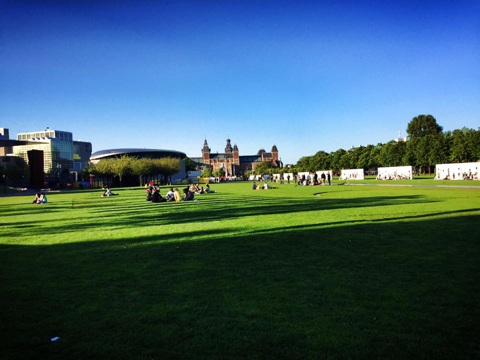 Photo of Museumplein in Amsterdam, one of the best places to visit in Amsterdam for free. Read more tips for visiting Amsterdam on a budget from a resident! #travel #europe #amsterdam #netherlands