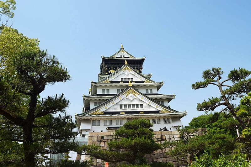 Castle in Osaka. Read how to have a cheap trip to Japan with money saving tips for visiting Japan on a budget.