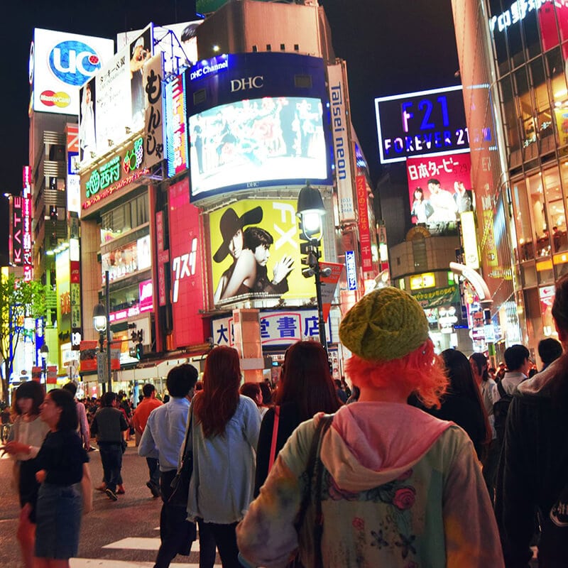 Shibuya Crossing in Tokyo, Japan. Read about the best ways to travel on a budget in Japan.