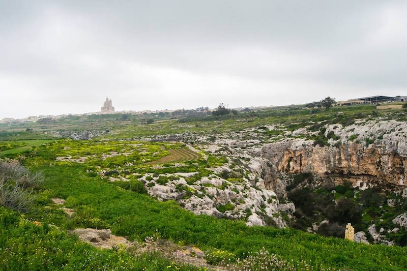 Countryside of Gozo, Malta's other island, that you must include in your Malta itinerary. Read how to get around Malta without a car and what to do on Gozo in one day! #travel #gozo #malta #europe