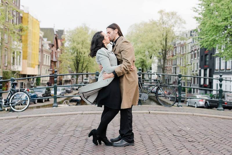 Photo of couple on bridge in Amsterdam. Tips for elopements and the best places to elope! 