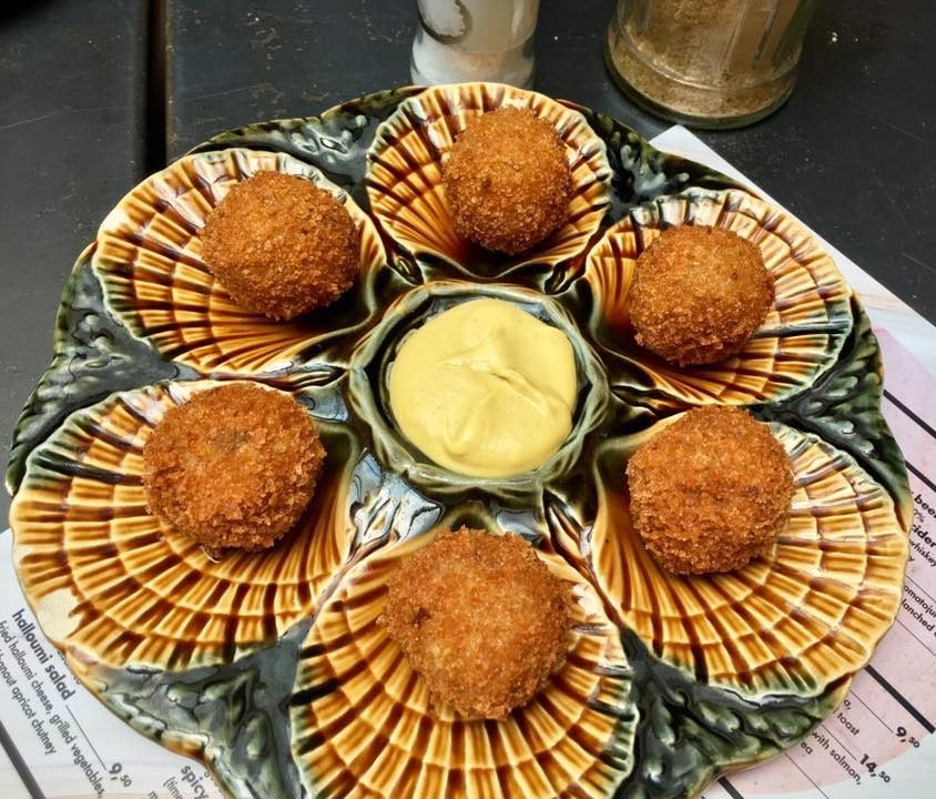 Bitterballen, one of the most popular Dutch foods to eat in the Netherlands. Be sure to add these to your Dutch food bucket list! #travel #Netherlands #Holland #Amsterdam