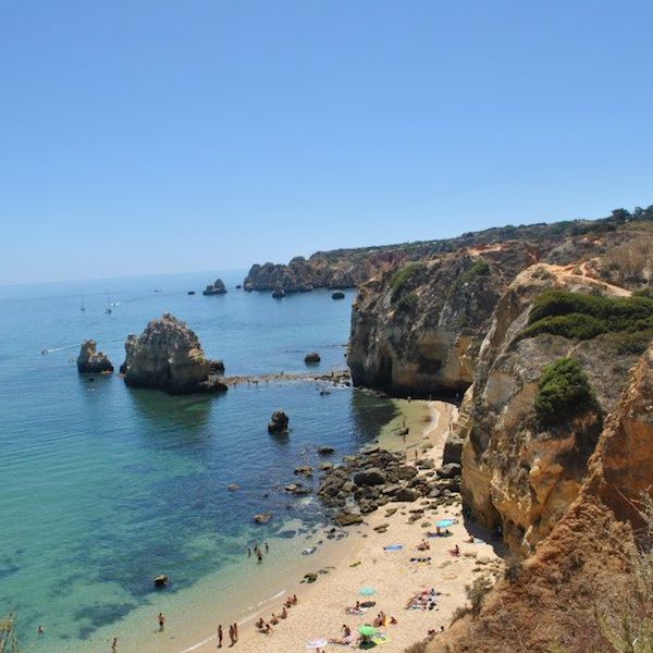 Beautiful cliffs in Lagos, Portugal. Read where to go in two months in Europe with tips for creating a Europe itinerary! #travel #europe #lagos #portugal 