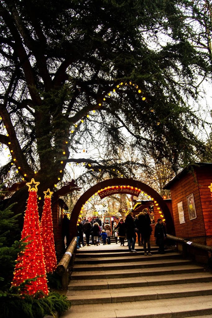 Entrance to the Stadtgarten Christmas Market in Cologne Germany. Read about the best Christmas markets in Cologne! #Cologne #Germany #Christmas