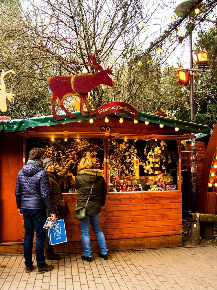 Stall in the Stadtgarten Christmas Market in Cologne. Read tips for visiting the German Christmas Markets in Cologne Germany.