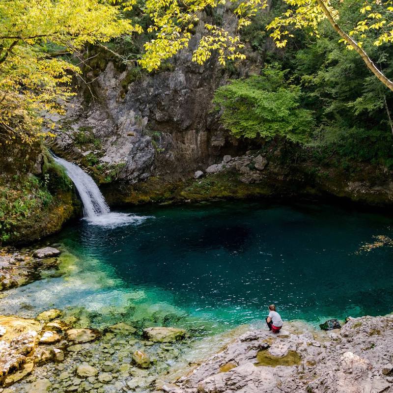 The Blue Eye of Thethi, one of the most beautiful places to visit in Albania. This spring in Theth Albania is worth including in your Albania itinerary! #Albania #travel #hiking #Balkans