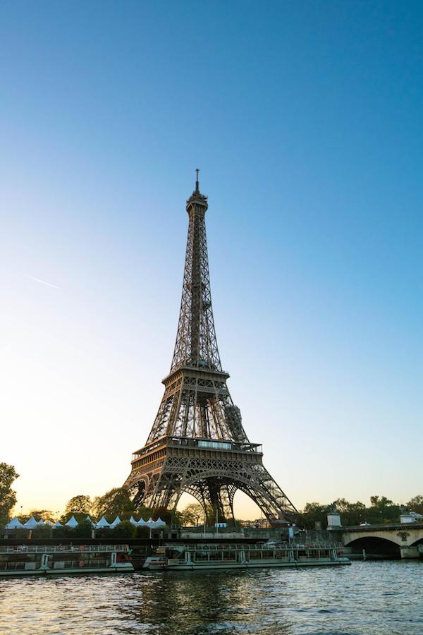 The Eiffel Tower in Paris at sunrise. Read the perfect itinerary for Europe with the best places to visit in Europe and cities to include on your European trip! #travel #Europe #Paris #France 