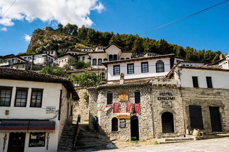 Stone buildings in Berat, Albania. This beautiful city in Albania is UNESCO recognized for its Ottoman-era architecture. You must include it in your Albania itinerary! #Berat #UNESCO #Travel #Europe #Albania