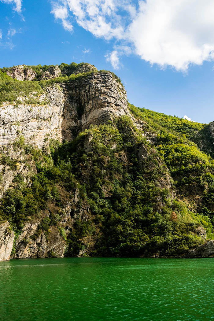 Beautiful photo of Kolmani Lake in Albania, one of the best attractions in Albania. #Albania #Travel #Balkans