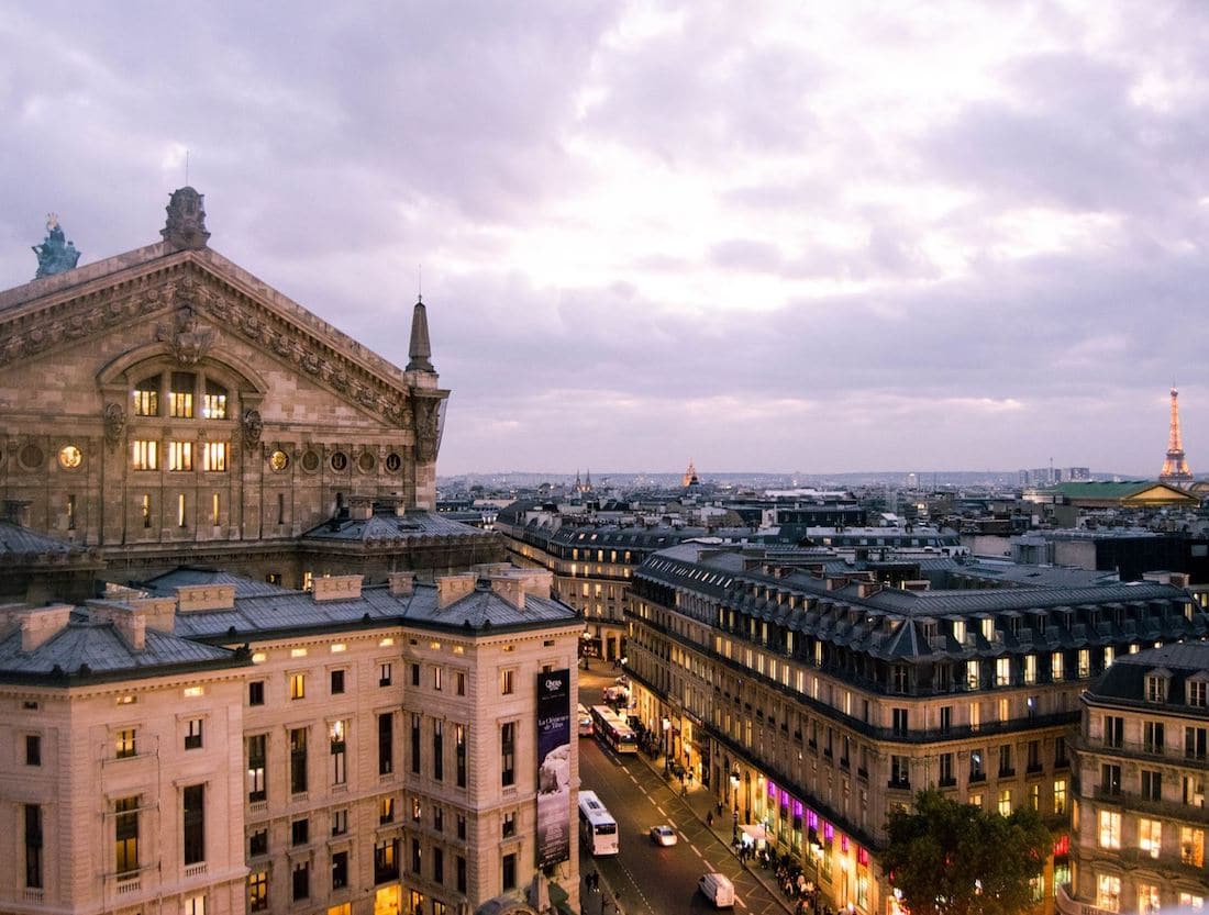 View over Paris at Galeries Lafayette, one of the best free viewpoints in Paris. Be sure to include this beautiful viewpoint in your Paris itinerary! #travel #paris #france