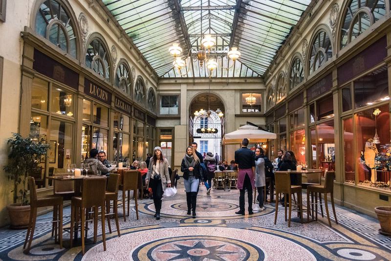 Photo of Galerie Vivienne, one of the most famous covered passages of Paris. A must see if you're looking for unusual things to do in Paris. 