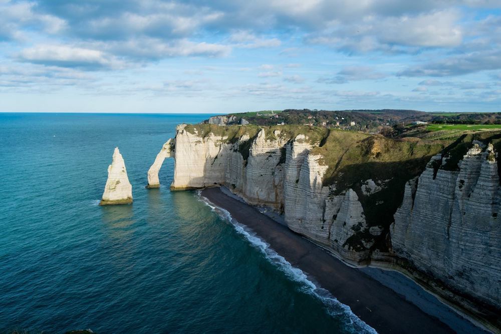 The famous cliffs of Étretat in Normandy. If you're taking a road trip in Normandy, you must put this on your Normandy itinerary! #travel #normandy #nature #france 