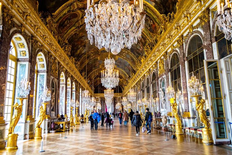 Hall of Mirrors in Versailles. During your Europe trip, consider taking a day trip from Paris to Versailles, France! #travel #Paris #France 