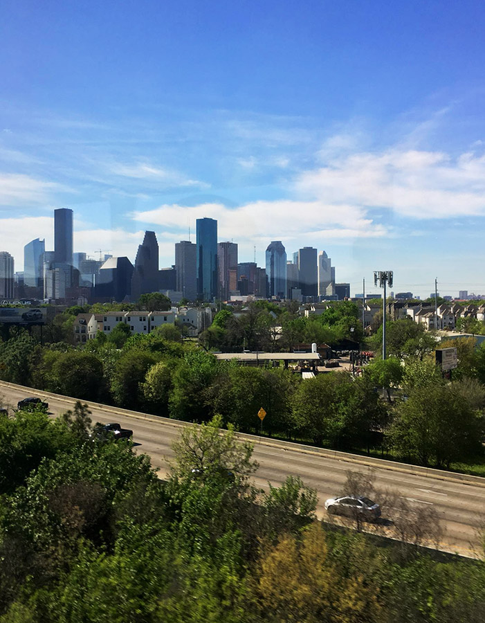 View of Houston, Texas. Read how to visit the United States without a car and other tips for saving money on travel in the US in this guide to budget travel in the US written by an American. #travel #USA #America #United States
