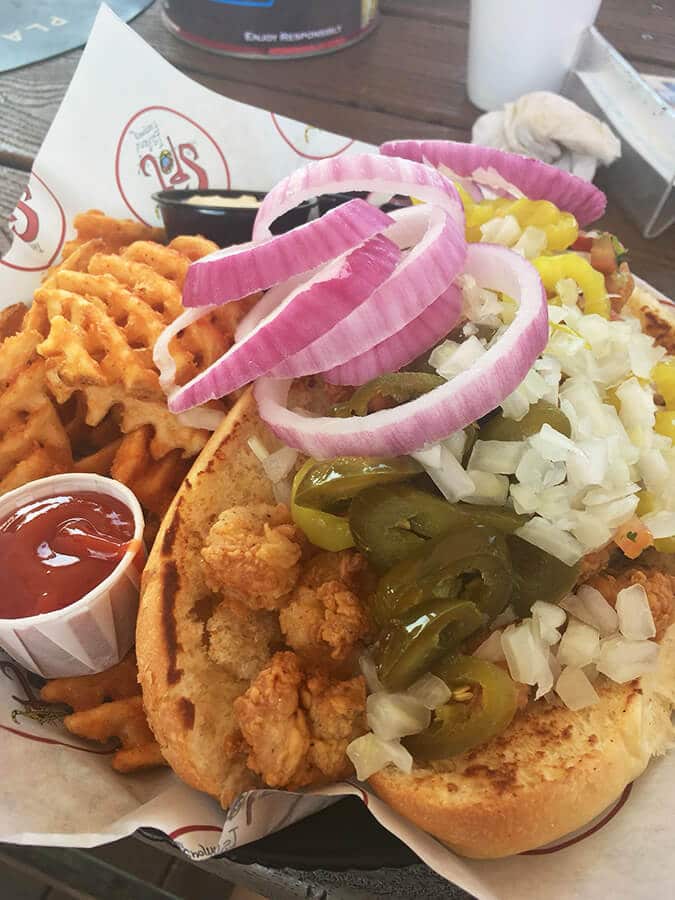 A delicious Po' Boy, a cajun sandwich, that is a popular thing to eat in Houston, Texas! #travel #food #houston #texas 