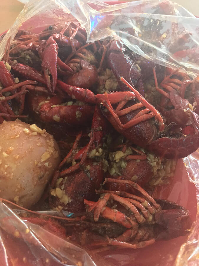 Viet-Cajun Crawfish in Houston, Texas.  This unique food in Houston is something that you must try while in Texas. #texas #houston #food #travel