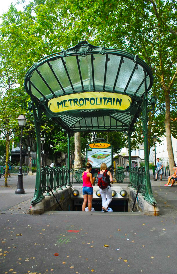 Abbesses Metro Station in Montmartre, one of the things to see in Montmartre. This historic Metro station is one of the most beautiful metro stations in Paris! #Paris #Metro #Travel