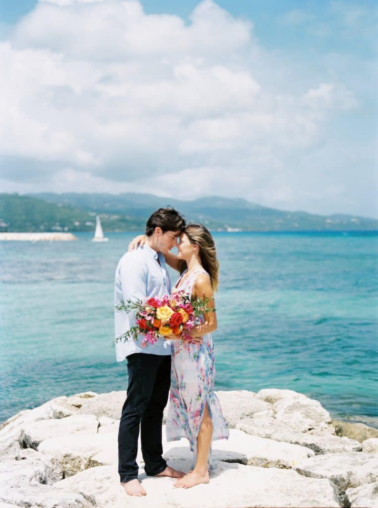 Photo of couple eloping in Jamaica. More elopement photo inspiration with the 15 best places to elope!