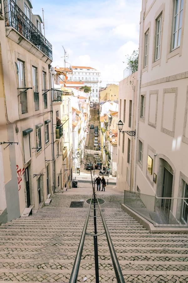 Beautiful streets of Lisbon Portugal. Read how to get a free flight to Lisbon with TAP Portugal Airlines. Read a review of flying on a budget to Europe with TAP Portugal Airlines Economy class. #airlines #Lisbon #travel #Portugal