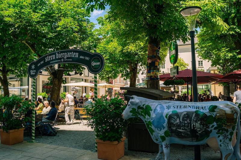 Scenic view of Sternbräu biergarten, a great place to get authentic Austrian food in Salzburg, Austria.  Read what to do in one day in Salzburg.