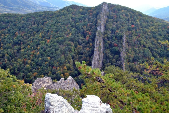 View of fins at Nelson Rocks. Read about what via ferrata is, what gear is needed for via ferrata, and the best via ferrata spots in the world!