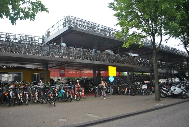 Bike parking garage in Amsterdam. Read tips on things to know about biking culture in Amsterdam!