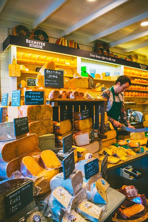 Cute small cheese shop selling Beemster cheese in Alkmaar, one of the best cheese day trips from Amsterdam! 