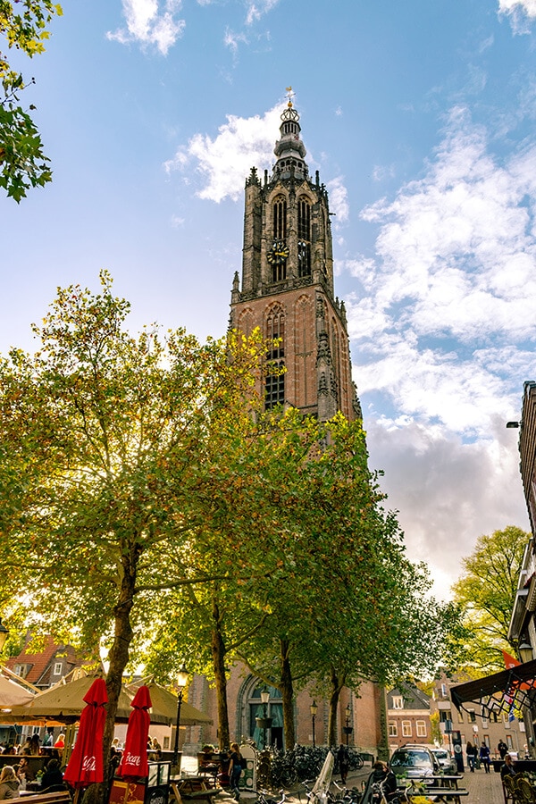 The beautiful historic Onze Lieve Vrouwetoren, one of the best attractions in Amersfoort, the Netherlands.  This beautiful day trip from Amersfoort is perfect for history lovers. #amersfoort #Netherlands #Nederland