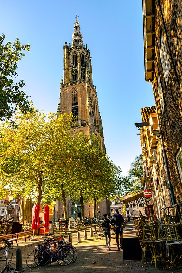 The stunning Onze Lieve Vrouwetoren, one of the highlights of visiting Amersfoort, the Netherlands.  This beautiful tower is full of history and secrets! #netherlands #nederland #amersfoort