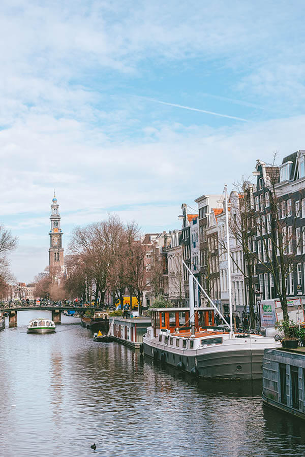 Beautiful photo of Amsterdam.  Read what it's like to travel to Amsterdam as a solo female traveler with tips from a resident. #travel #amsterdam #holland #netherlands #nederland