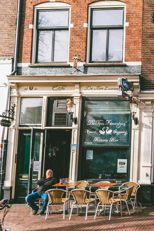 Exterior of a classic brown bar (a typically Dutch brown bar) in the Jordaan neighborhood of Amsterdam where you can experience an Amsterdam beer like a local! #amsterdam #netherlands #nederland #holland #jordaan