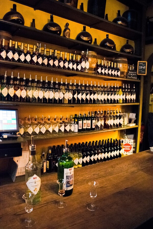 Historic interior at Wynand Fockink, one of the best places to try genever, Dutch gin, in Amsterdam! This authentic bar in Amsterdam is the perfect place to learn about jenever! #amsterdam #netherlands #travel 