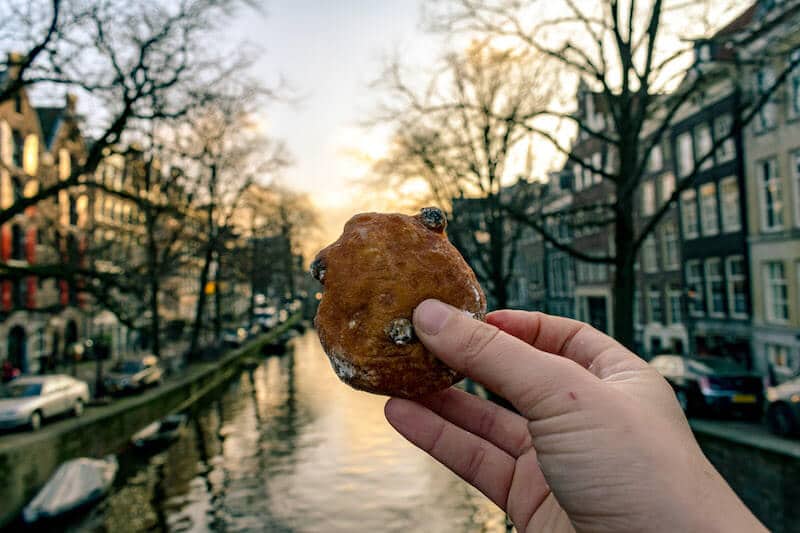 Beautiful view of a canal and one of the cutest streets in Amsterdam that you'll want to take photos on! #amsterdam #holland #travel