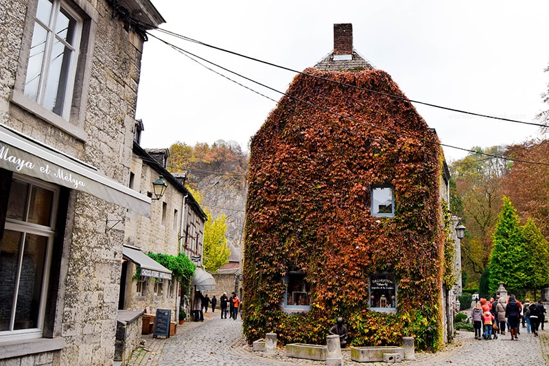  Beautiful vine covered building in Durbuy. Visit Wallonia in fall for beautiful foliage in Belgium!