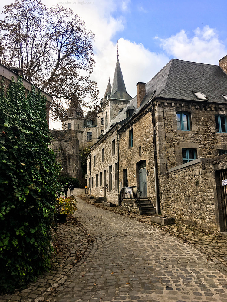 Beautiful cobblestone street in Durbuy Belgium. Discover reasons to visit this beautiful Belgian city! #Belgium #Durbuy #Travel