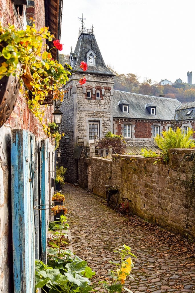 Photo of beautiful alleyway in Durbuy. See why you should visit Belgium for beautiful cities with beautiful chateaux! 