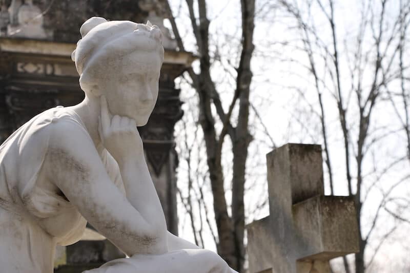 Montparnasse Cemetery in Paris. Read about visiting Montparnasse with a neighborhood guide to the 14th arrondissement. #travel #paris #france