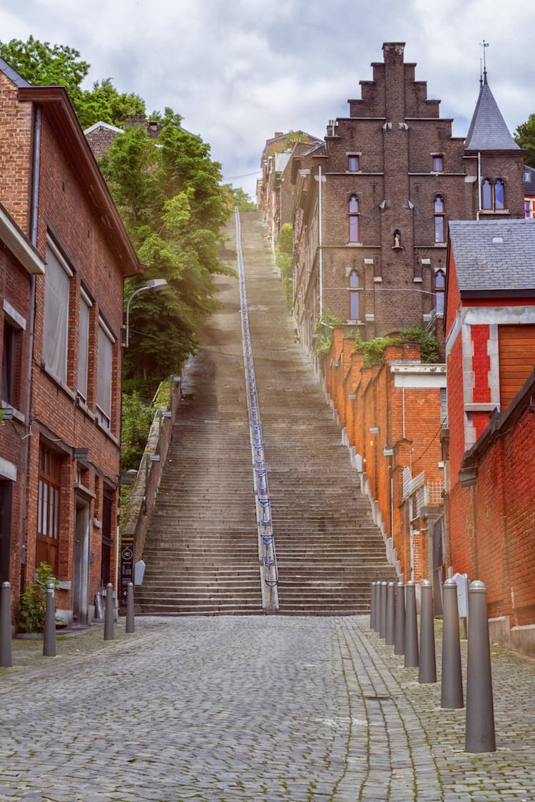 Photo of the Montagne de Bueren in Liege Belgium. Read about the most beautiful places to visit in Belgium's Wallonia region. #Travel #Belgium #Wallonia