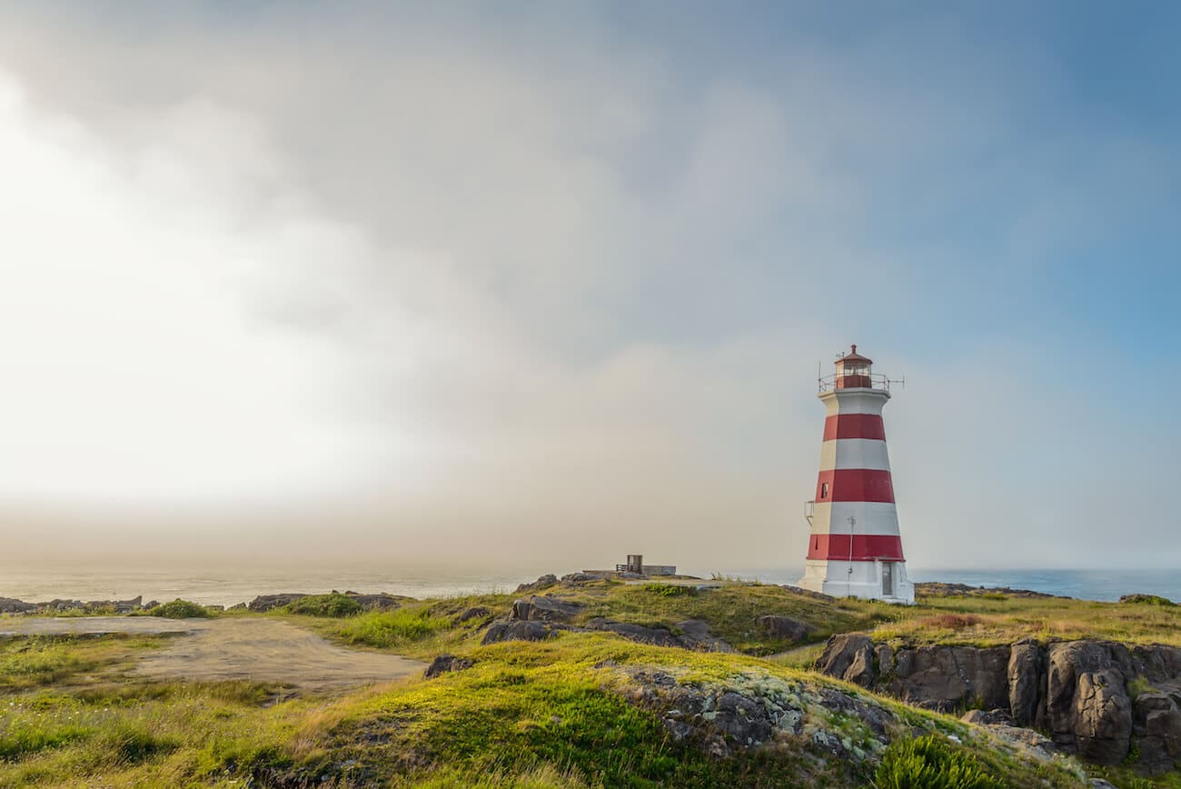 Beautiful light house on Nova Scotia. Read Nova Scotia travel tips to know before you travel to this beautiful part of Canada!