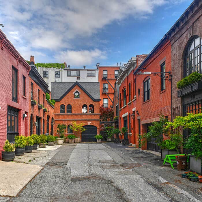 Get a glimpse of secret New York City in Grace Court.  This former parking lot/stable is one of the best secret places to visit in Brooklyn! #travel #NYC #NewYork 