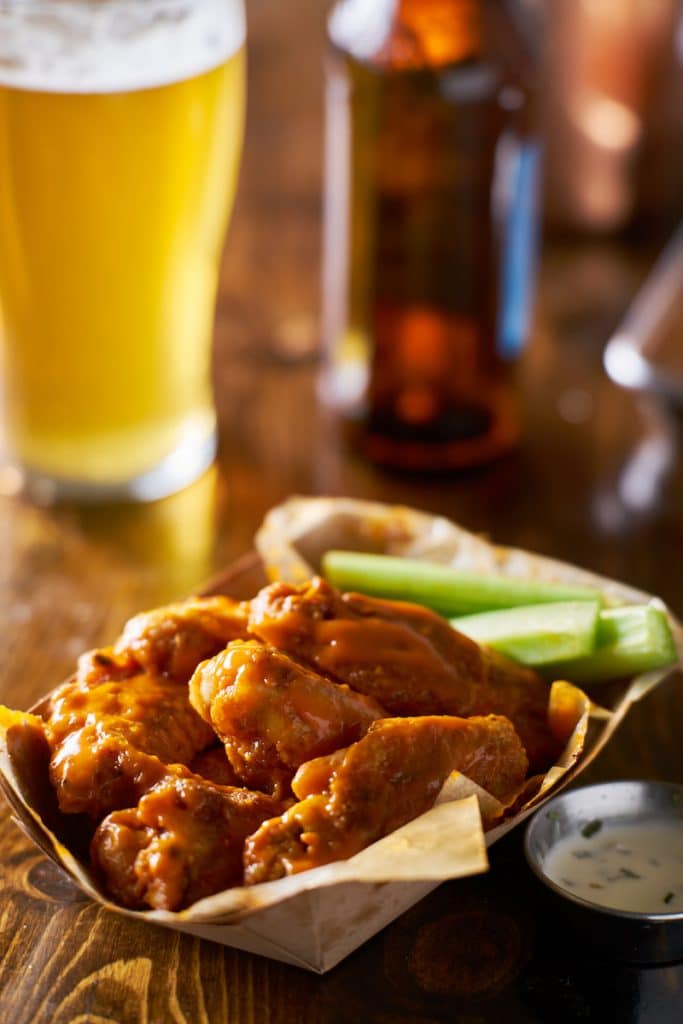 Find out where to get the best Buffalo wings in Buffalo NY in a local guide on the best places to eat in Buffalo and WNY food that you must try in Buffalo! #travel #food #WNY #Buffalo #Buffalove #USA #foodtravel