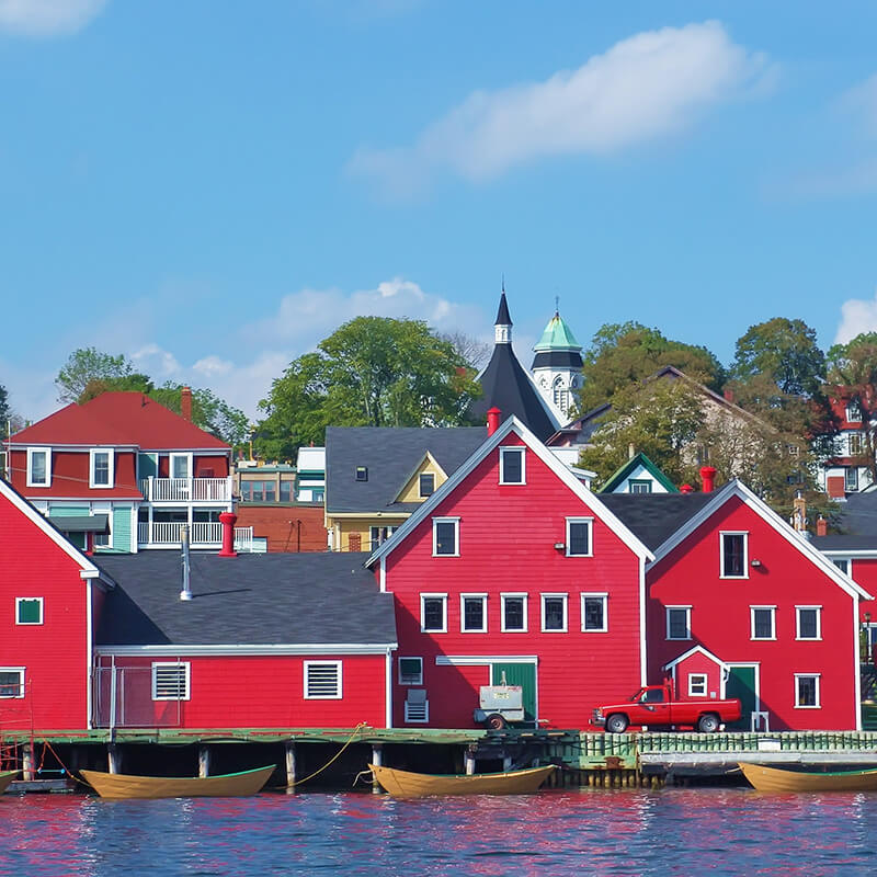 Red houses in the stunning UNESCO recognized Canadian town of Lunenburg in Nova Scotia. #travel