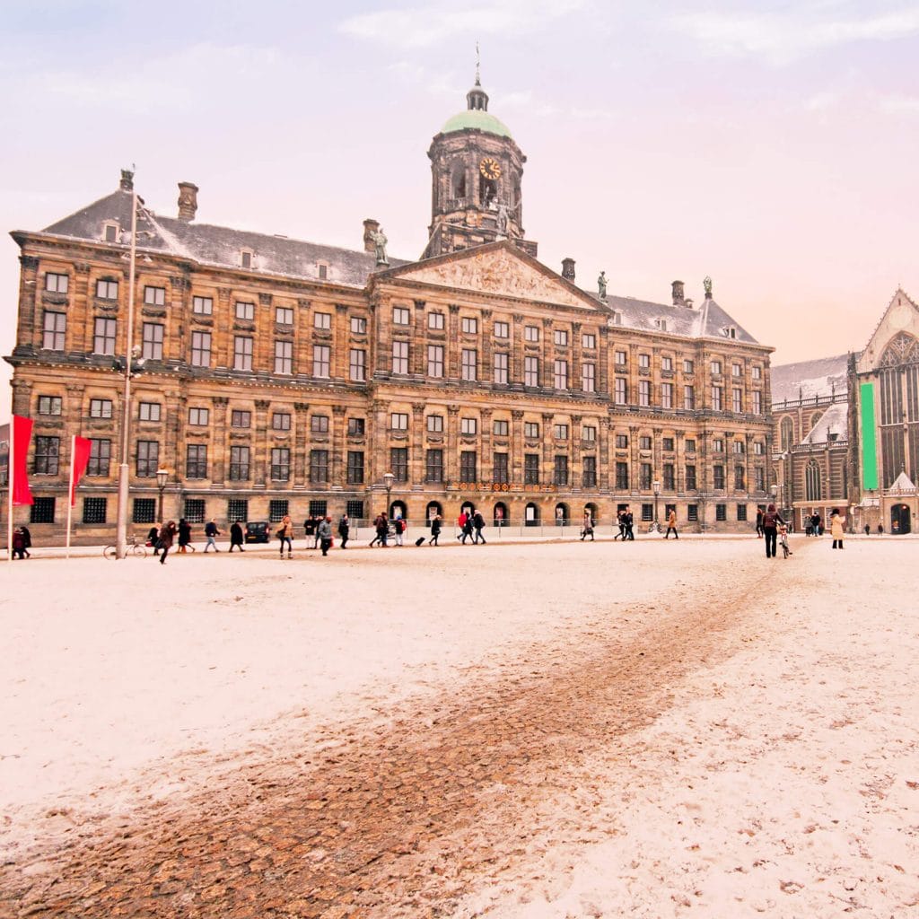 Dam Square covered in snow in winter. #amsterdam #Netherlands