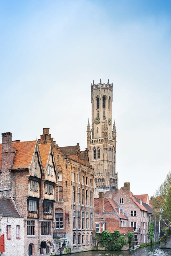 Beautiful city and canals in Bruges (Brugge) Belgium. Read what cities to visit Europe during your first trip to Europe with tips for creating the perfect European itinerary! #travel #europe #bruges #Brugge #Belgium #Belgie