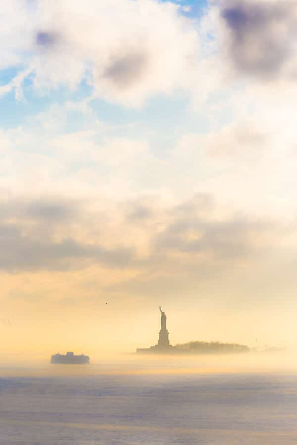 Photo of the Statue of Liberty and Staten Island Ferry, one of the best things to do in New York City in five days. #travel #NYC #NewYork