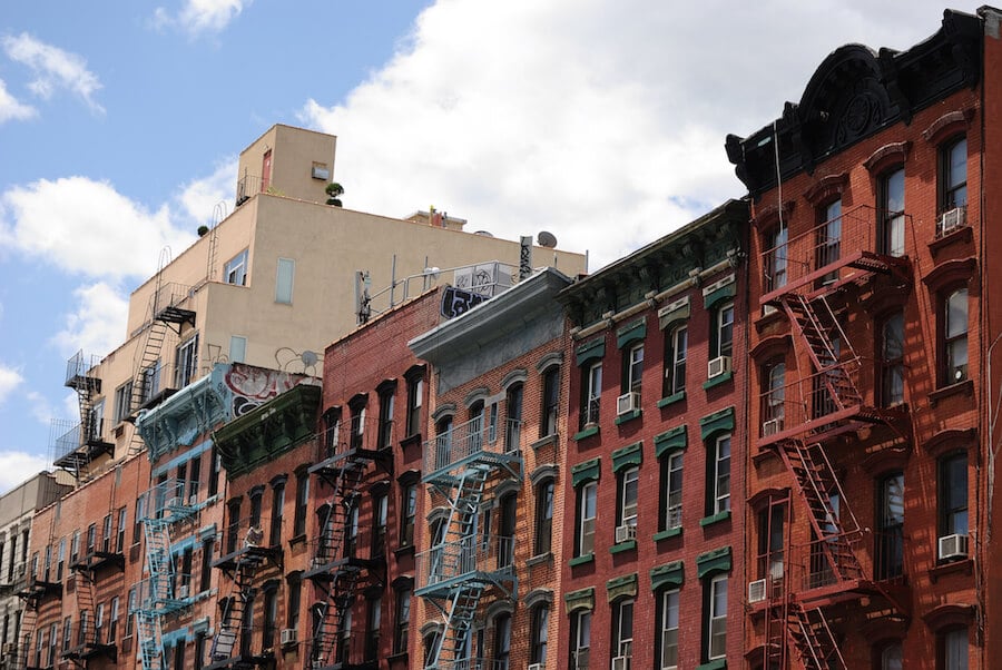 Photo of old tenement buildings on the Lower East Side, a historic part of Manhattan, included on this self-guided walking tour of Manhattan with subway stops. #travel #NYC
