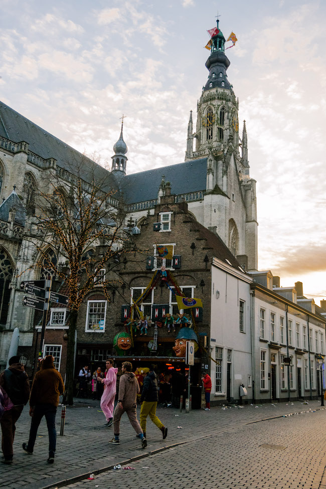 Revelers in Breda (Kielegat) for Carnival in the Netherlands. Read about this Dutch festival and what you need to know before celebrating carnival in the Netherlands! #Dutch #Netherlands #Travel #Breda