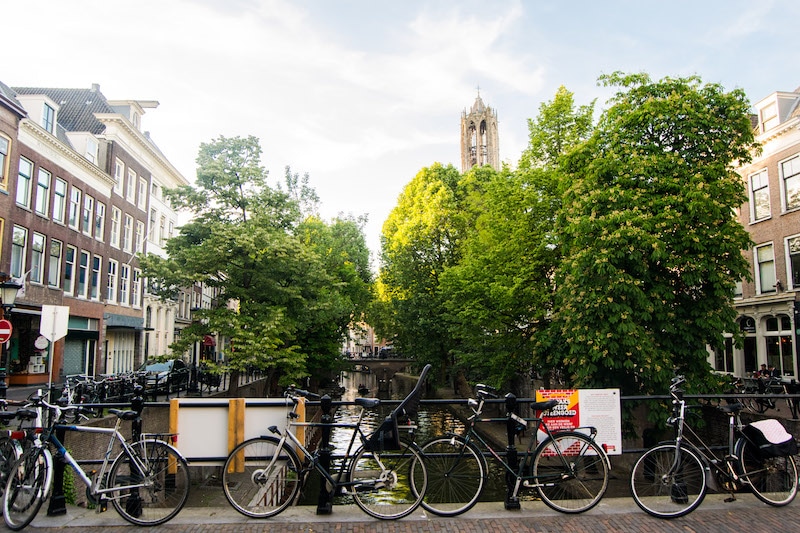 Bicycles by canal in Utrecht. Read about what to do in Utrecht in this perfect day trip from Amsterdam! #travel #netherlands #Utrecht #europe