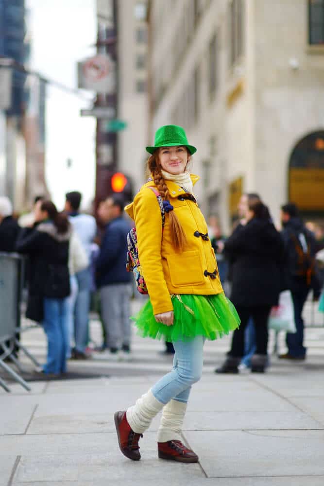 Girl enjoying St. Patrick's Day Parade in New York City dressed in green tutu!